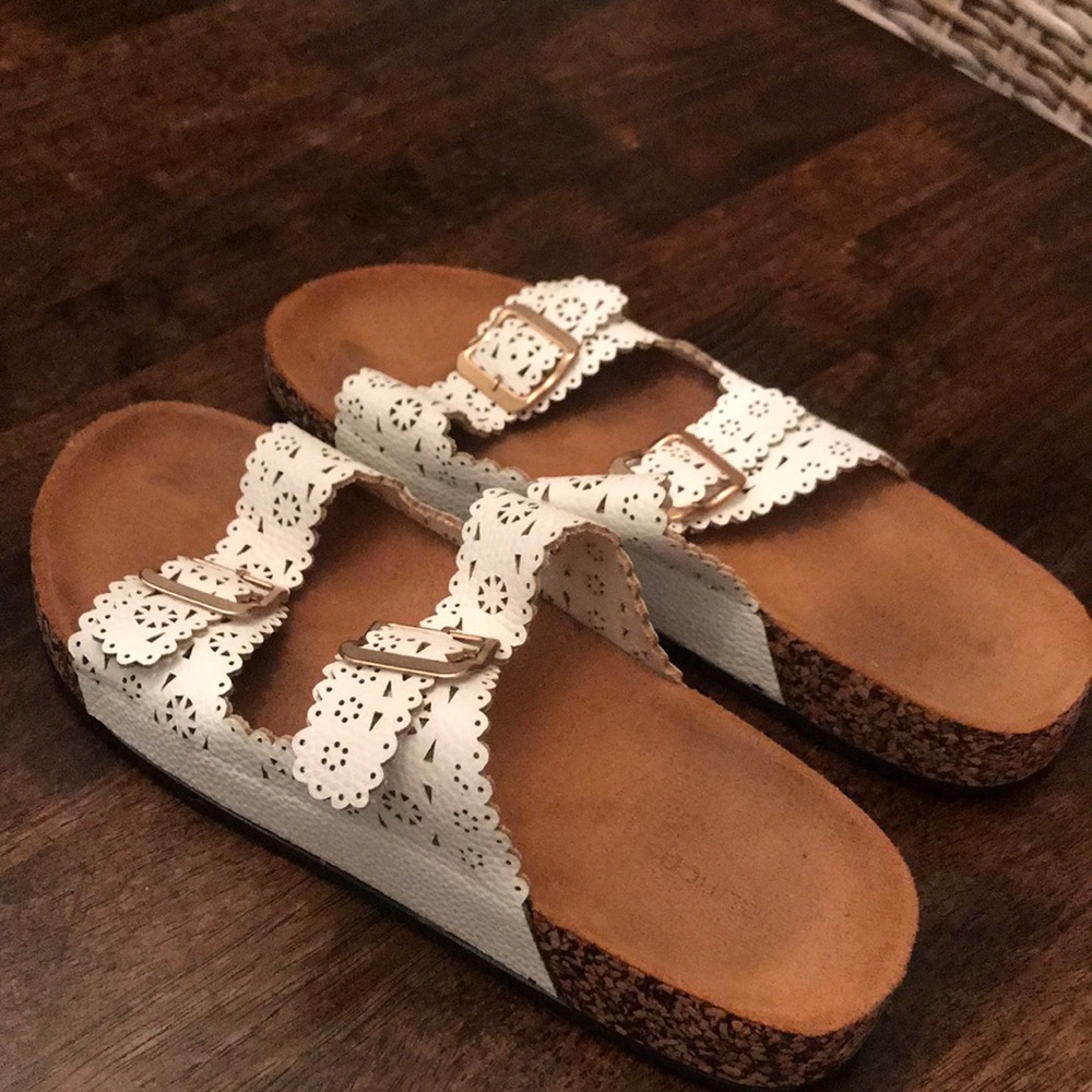 Maurice white laser cut sandals